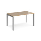 Rectangular desk with wood-effect top and silver metal frame on a white background