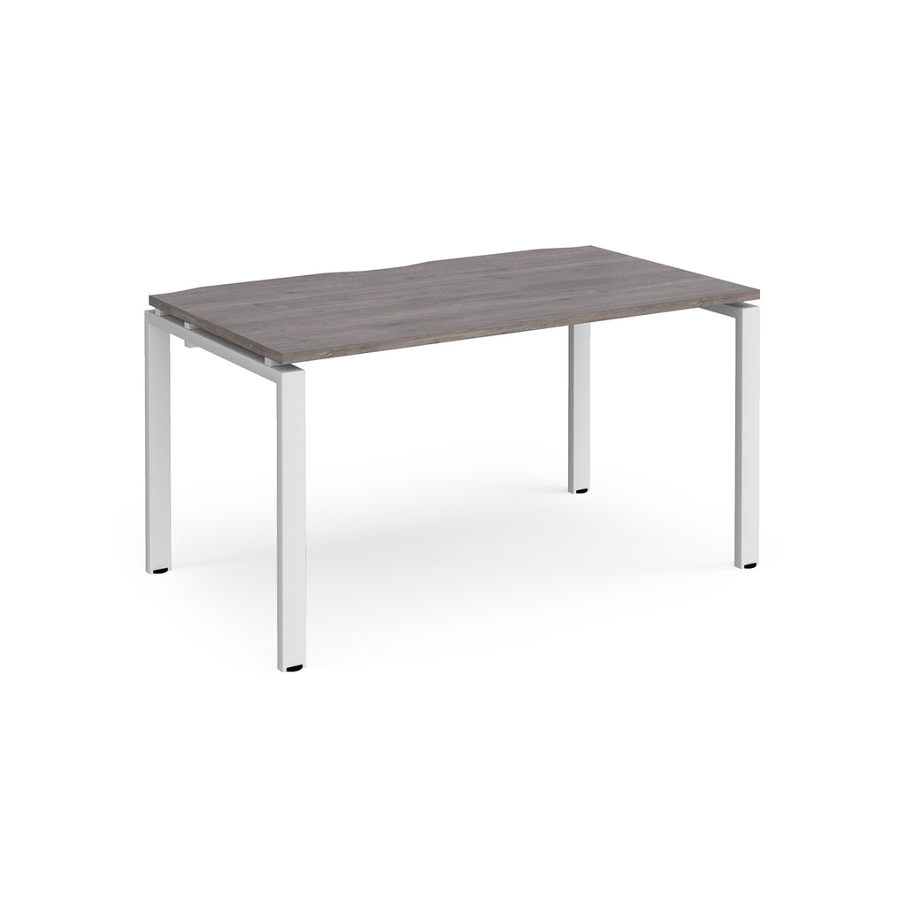 Rectangular desk with grey wood-effect top and white metal frame on a white background