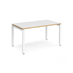 Rectangular desk with white top with wood edges and white metal frame on a white background