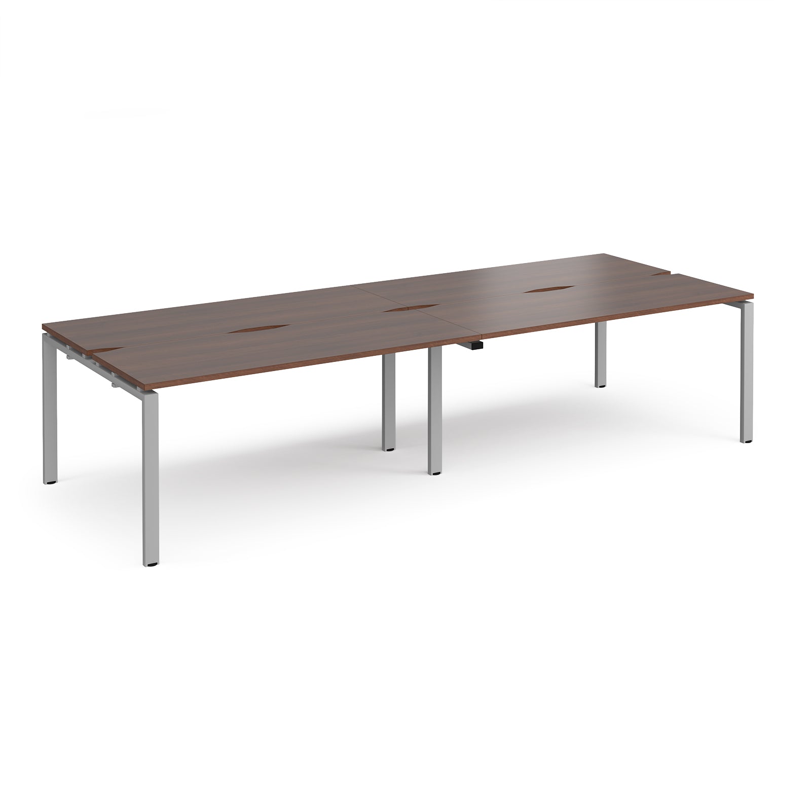 Four back-to-back desks with wood-effect tops and silver metal frame on a white background