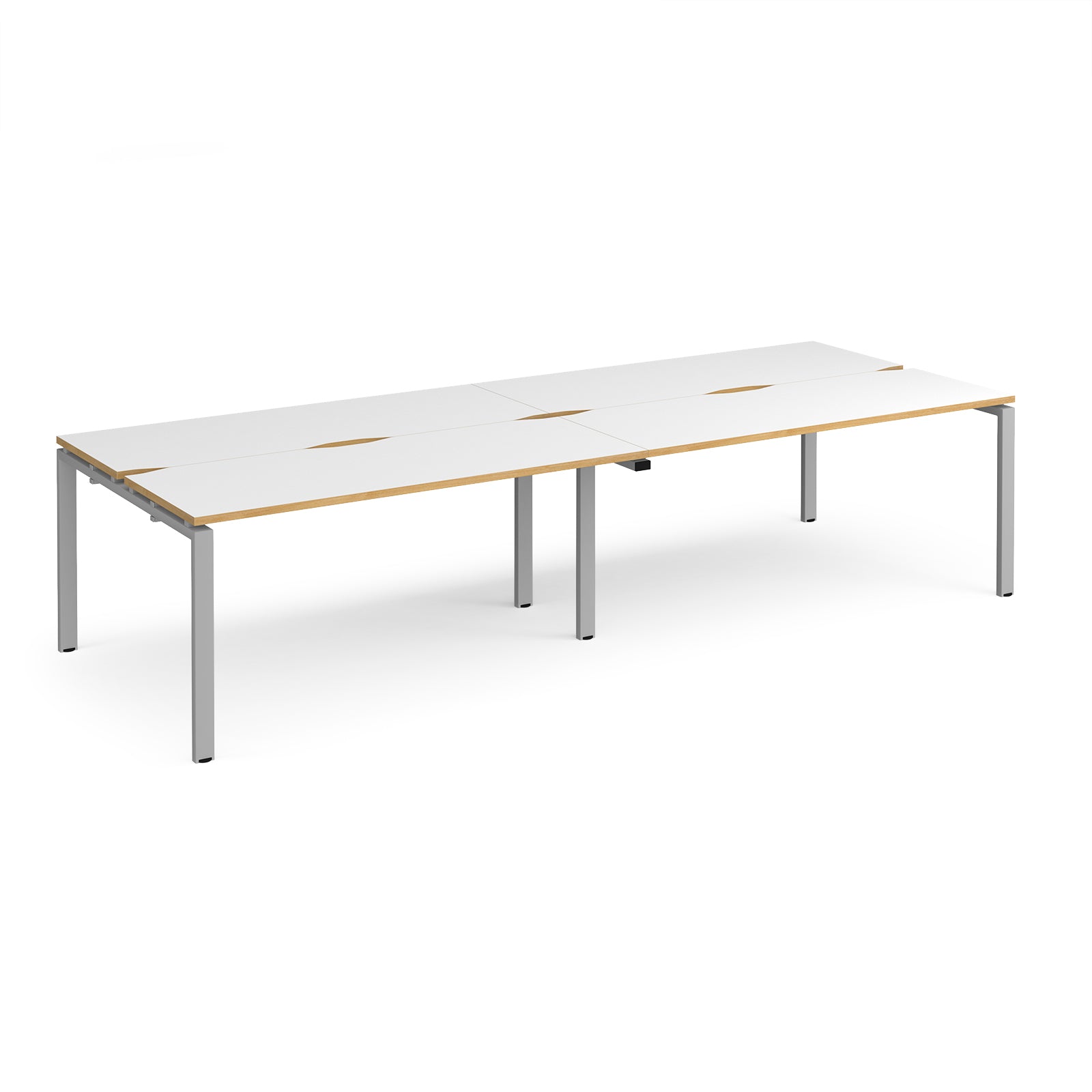 Four back-to-back desks with white tops with wooden edges and silver  metal frame on a white background