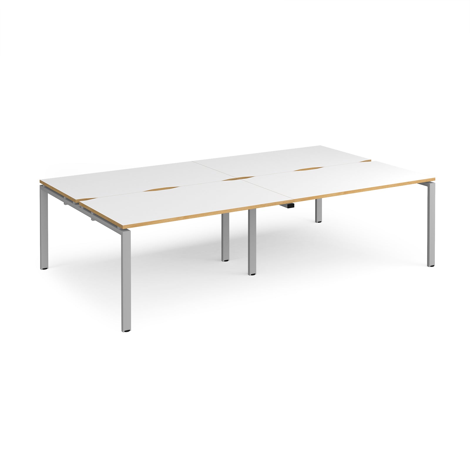 Four back-to-back desks with white tops with wooden edges and silver metal frame on a white background