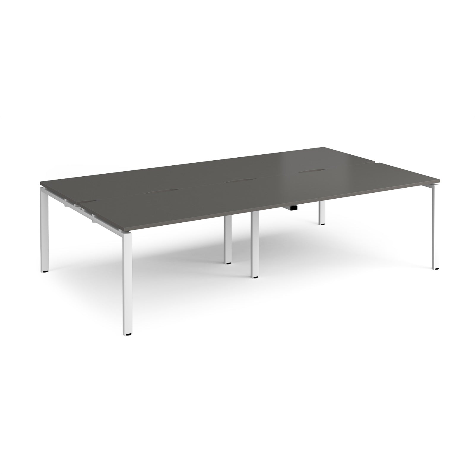 Four back-to-back desks with grey tops and white metal frame on a white background