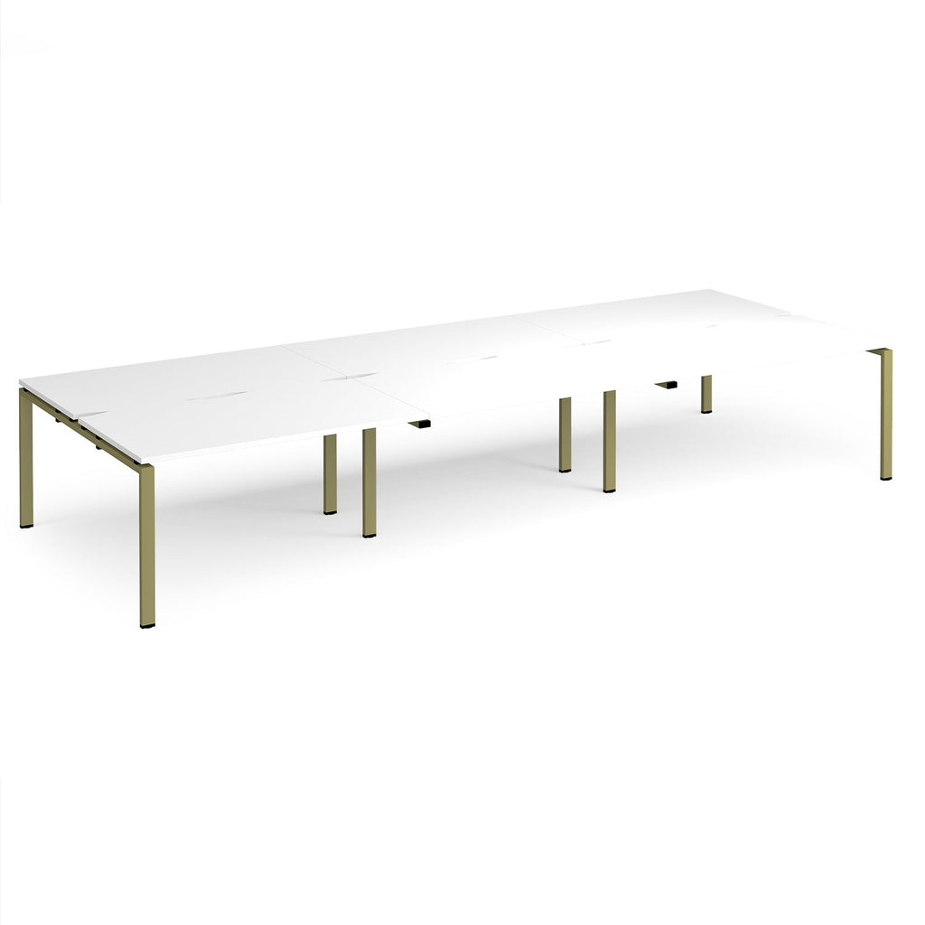Long back-to-back desk with white top and green metal frame on a white background