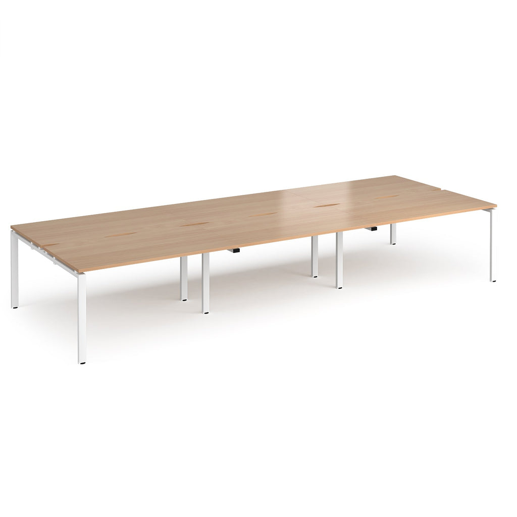 Long back-to-back desk with wood-effect top and white metal frame on a white background