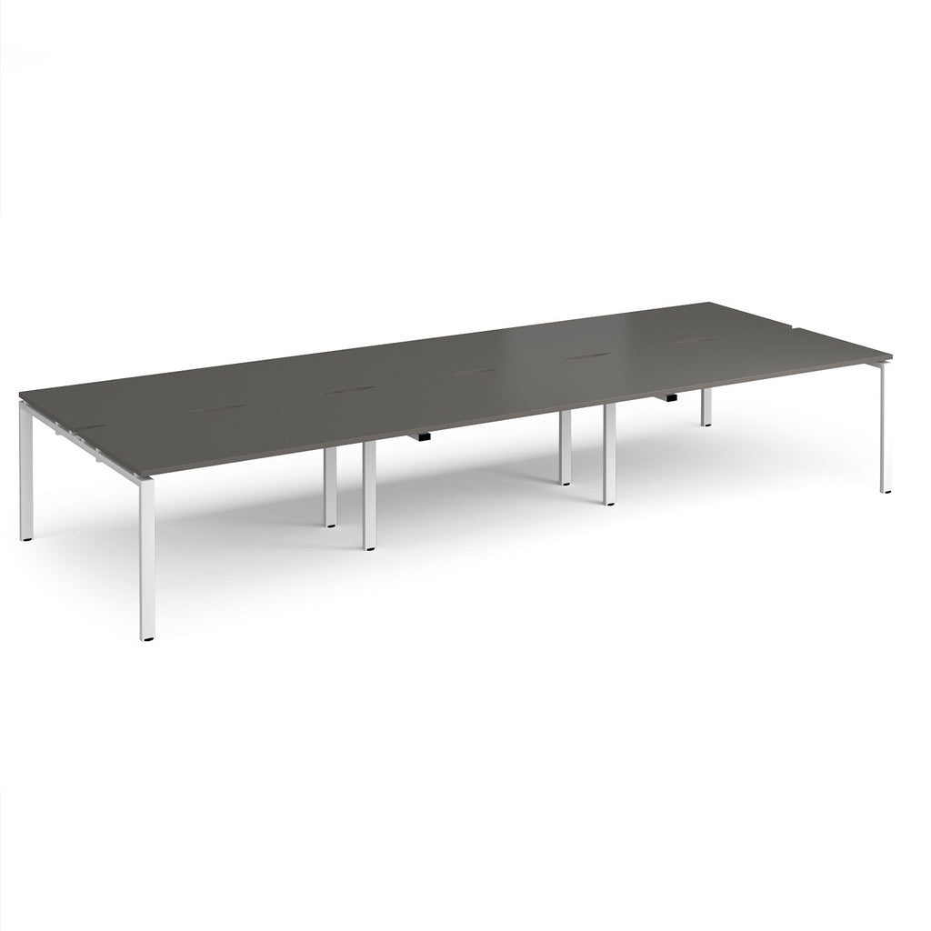 Long back-to-back desk with wood-effect top and black metal frame on a white background
