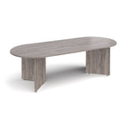 Oval-shaped grey wood-grain table on a white background