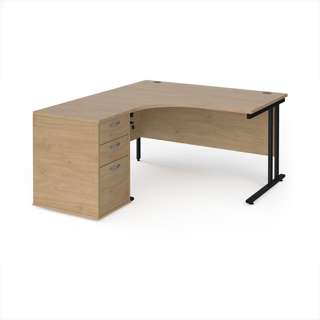 Wooden corner desk with metal legs and matching pedestal on a white background