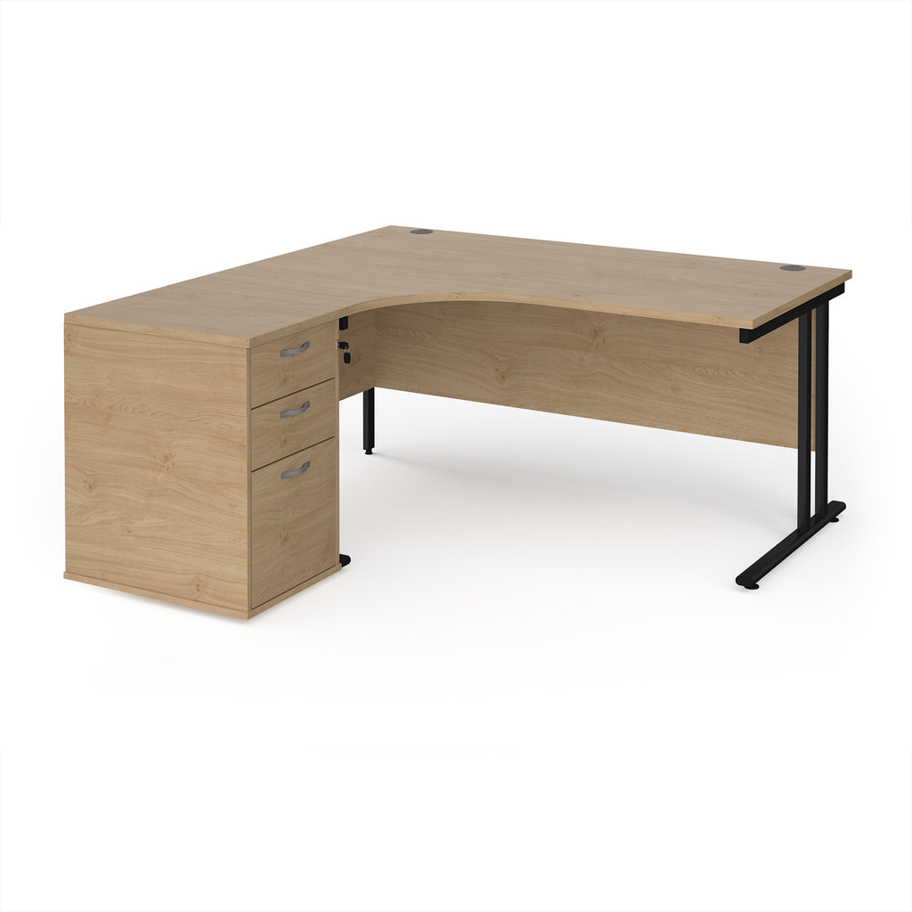 Wooden corner desk with metal legs and matching pedestal on a white background