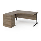 Wooden corner desk with metal legs and matching pedestal on a white background