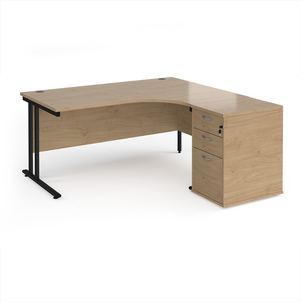 Wooden corner desk with metal legs and matching pedestal on a white background
