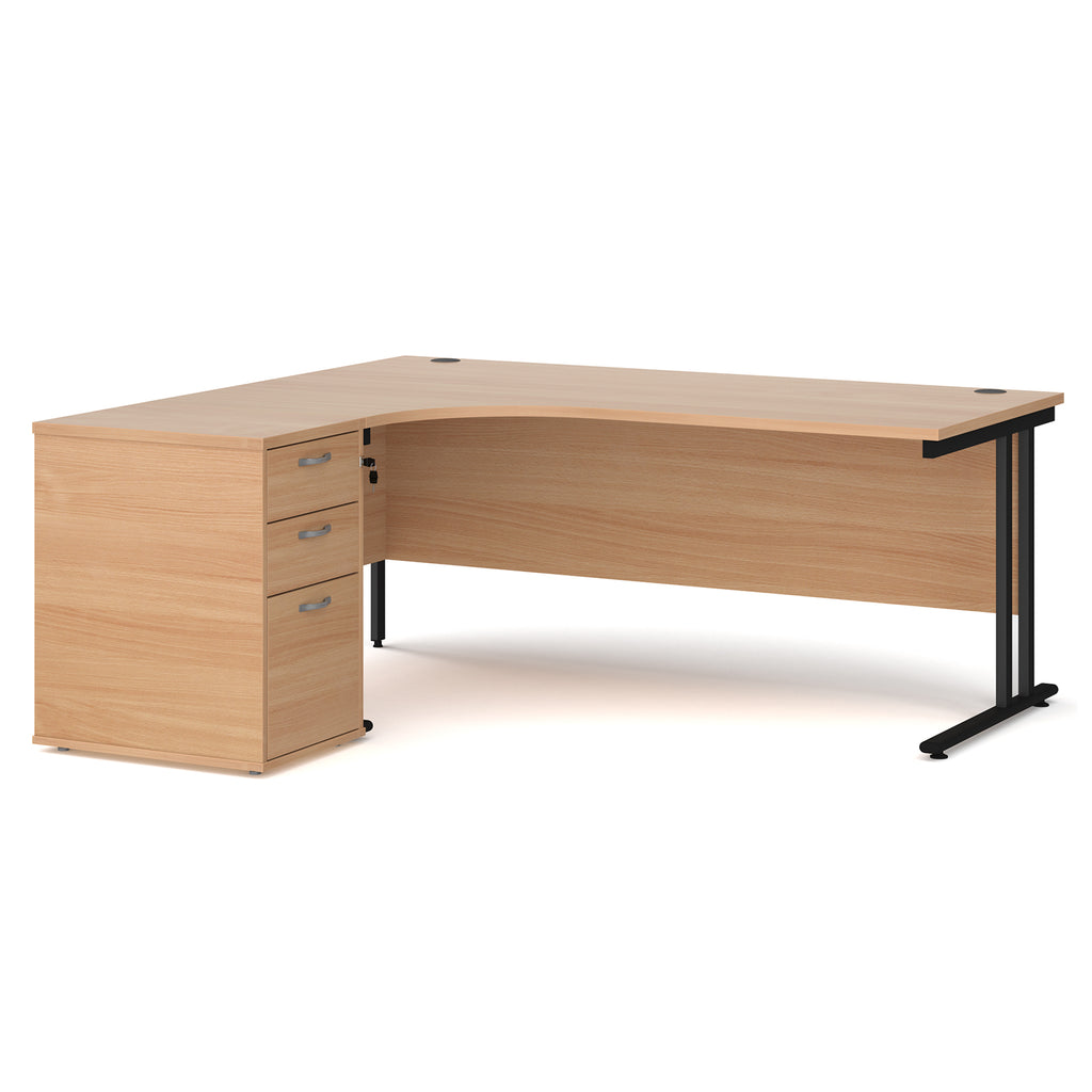Wooden corner desk with metal legs and matching pedestal on a white background