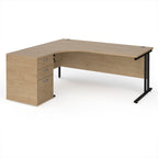 Wooden corner desk with metal legs and matching pedestal on a white background