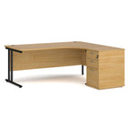 Wooden corner desk with metal legs and matching pedestal on a white background