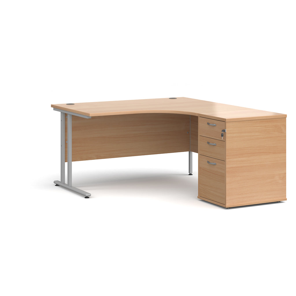 Wooden corner desk with metal legs and matching pedestal on a white background