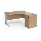 Wooden corner desk with metal legs and matching pedestal on a white background