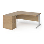 Wooden corner desk with metal legs and matching pedestal on a white background