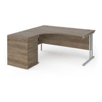 Wooden corner desk with metal legs and matching pedestal on a white background