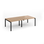 A modern rectangular table with a light beech wood grain top and black metal legs, shown on a clean white background.