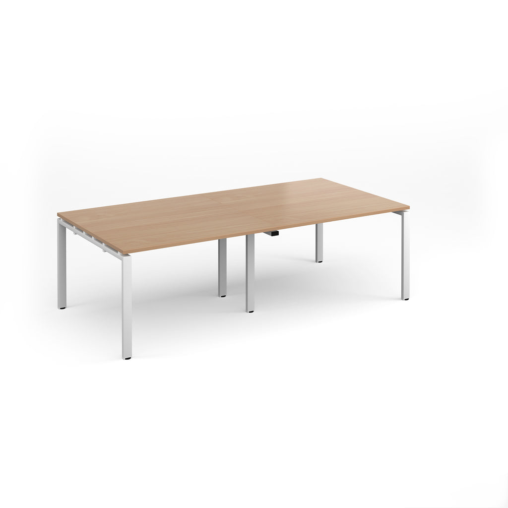 A rectangular office table with a light wood grain top and slim white metal legs, shown on a clean white background.