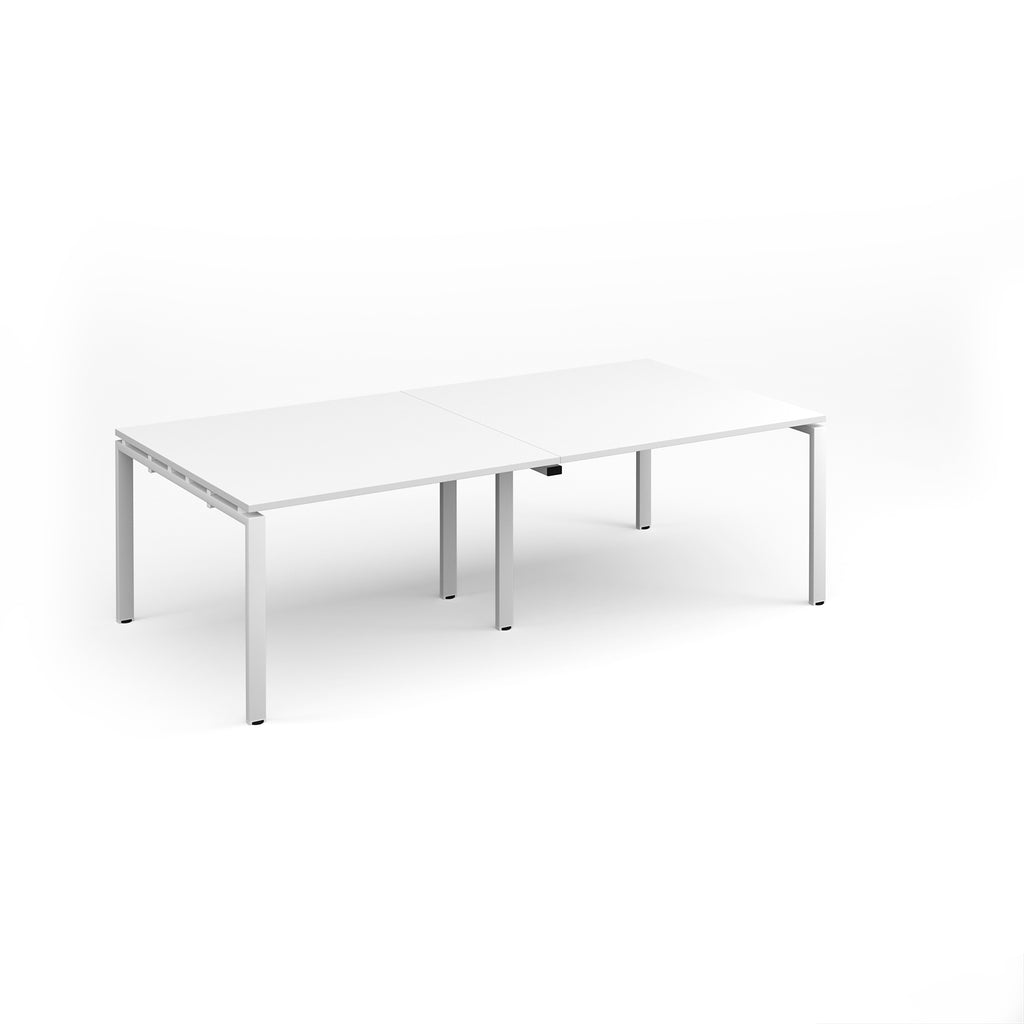 A modern white rectangular meeting table with metal legs, shown on a seamless white background.