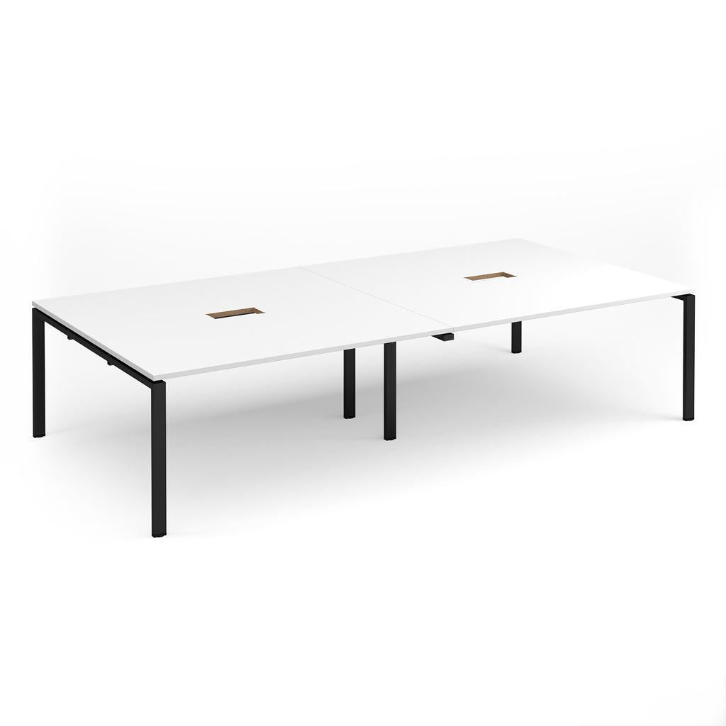 Rectangular meeting table with white top with two cut-outs and black metal frame on a white background