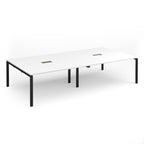 Rectangular meeting table with white top with two cut-outs and black metal frame on a white background