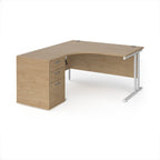 Wooden corner desk with metal legs and matching pedestal on a white background