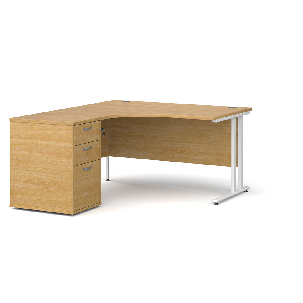 Wooden corner desk with white metal legs and matching pedestal on a white background