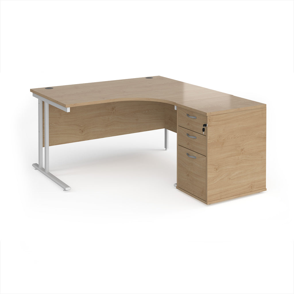 Wooden corner desk with metal legs and matching pedestal on a white background