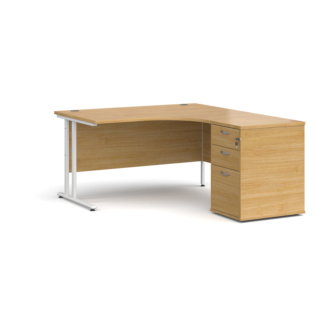 Wooden corner desk with metal legs and matching pedestal on a white background