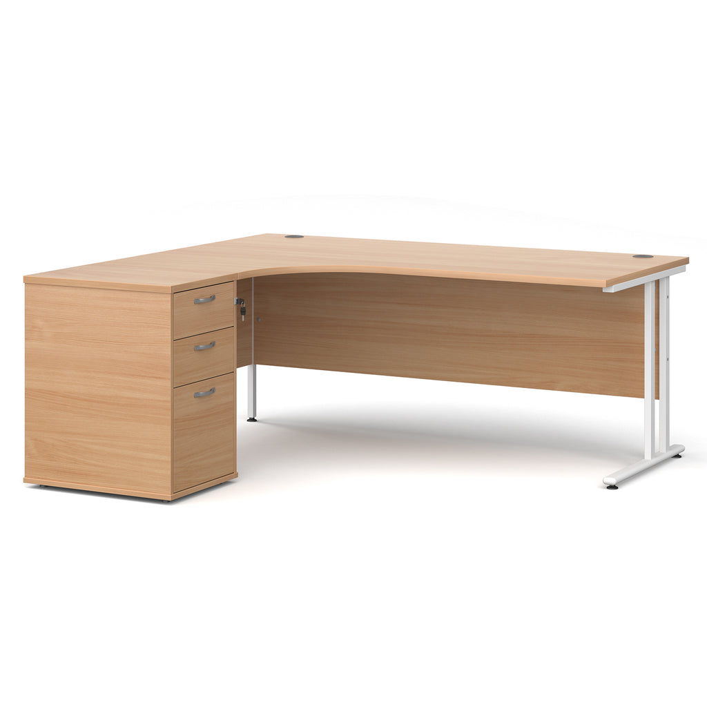 Wooden corner desk with metal legs and matching pedestal on a white background