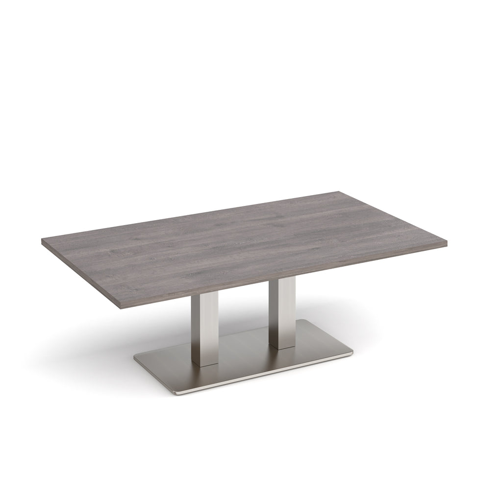 A rectangular coffee table with a grey wood-grain top and a brushed steel metal pedestal base, shown on a clean white background.