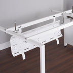 White metal office desk with a minimalist design on a wooden floor.