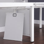 White office desk with a cable riser in an office setting