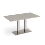A modern rectangular table with a light grey top and a brushed steel metal pedestal base, shown on a clean white background.