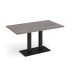 A rectangular dining table with a grey wood-grain top and a black metal pedestal base, shown on a plain white background.
