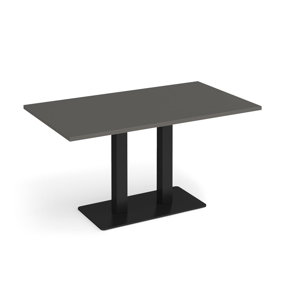 A modern rectangular table with a dark grey top and a black double pedestal base, shown on a clean white background.