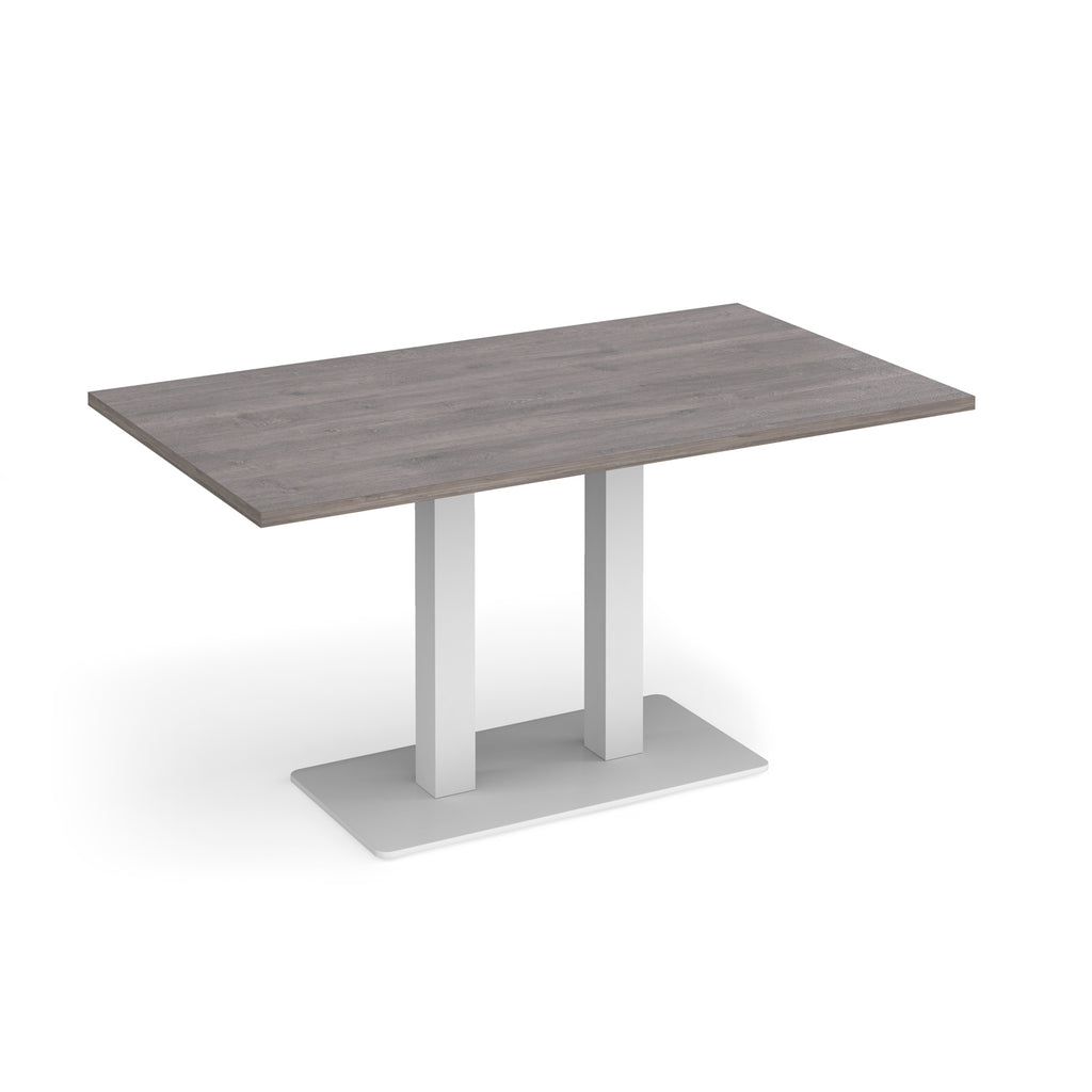 A modern rectangular table with a grey wood-grain top and a white metal pedestal base, shown on a clean white background.