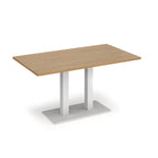 A rectangular table with a light oak wood grain top and a white metal pedestal base, shown on a plain white background.