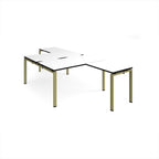 L-shaped back-to-back desks with white top with black edges and a green metal frame on a white background