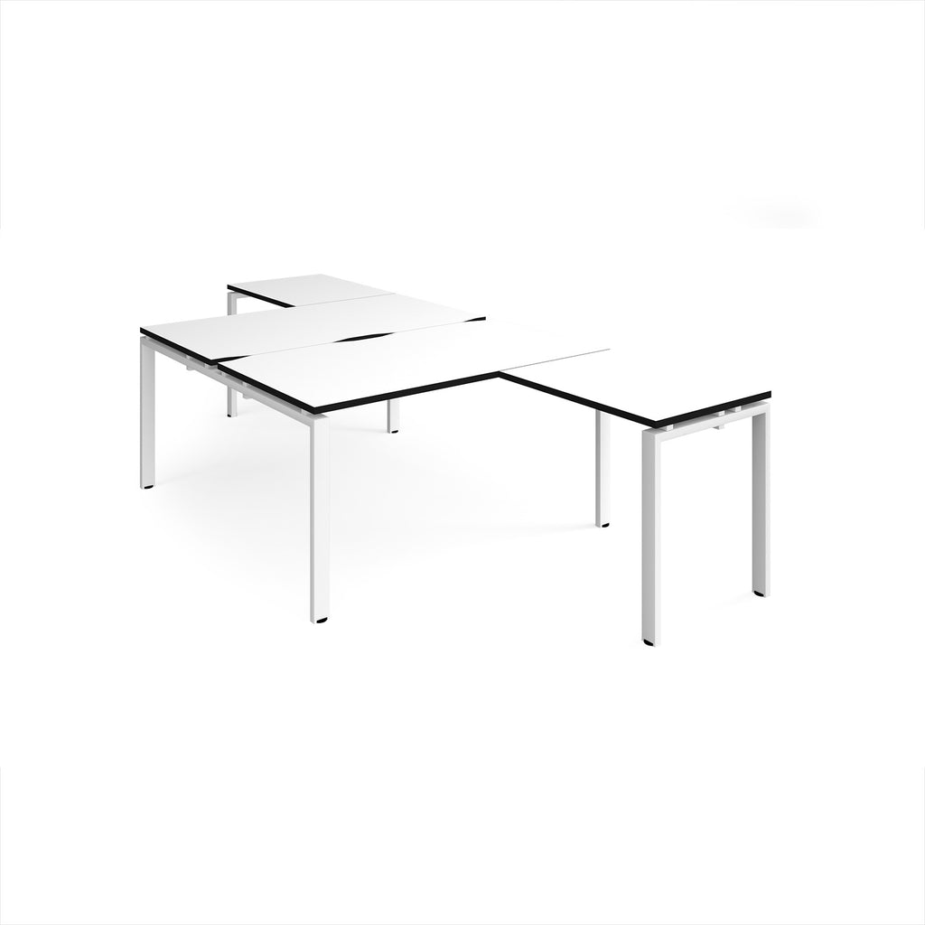 L-shaped back-to-back desks with white top with black edges and a white metal frame on a white background