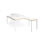 L-shaped back-to-back desks with white top with wooden edges and a white metal frame on a white background