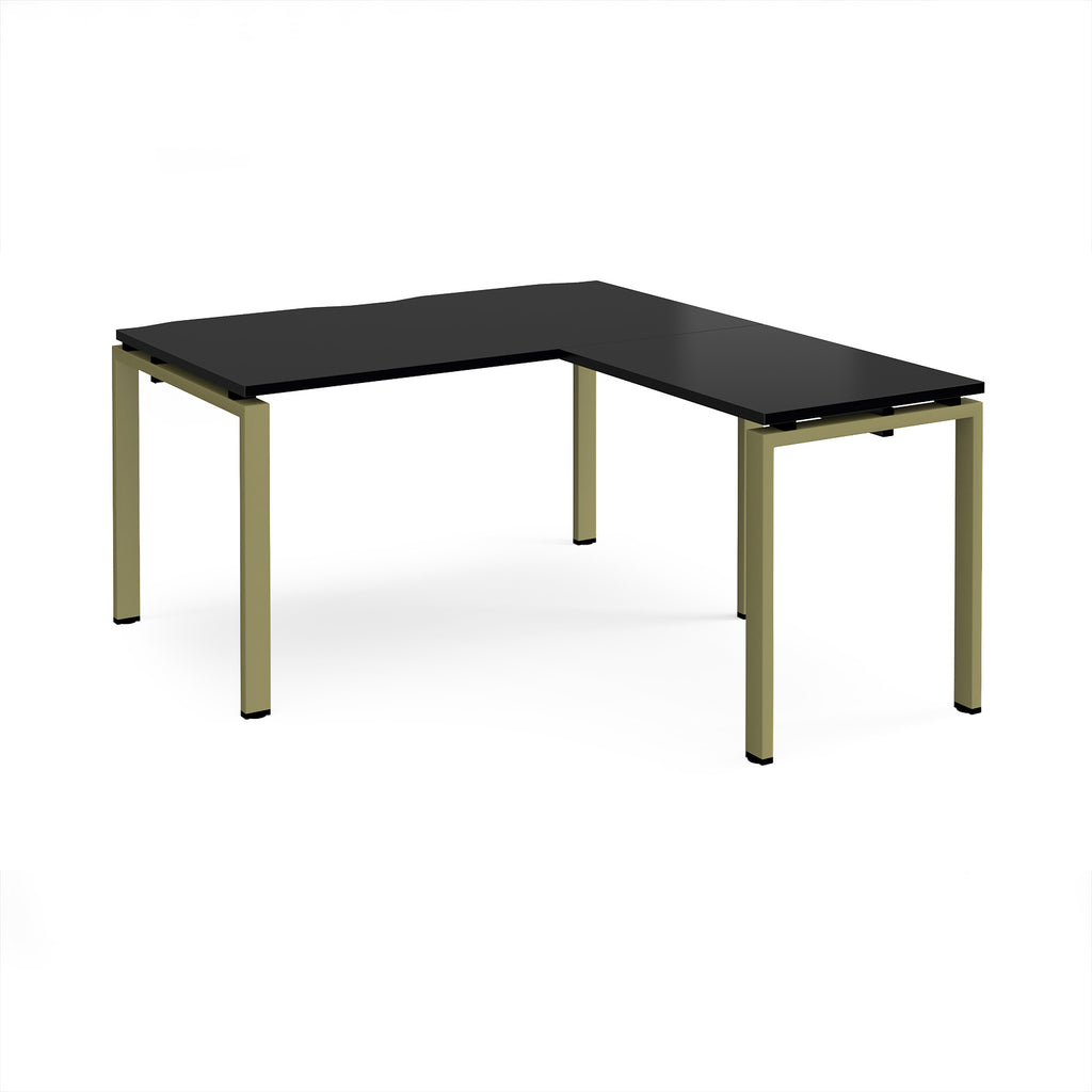 L-shaped desk with black top and green metal frame on a white background
