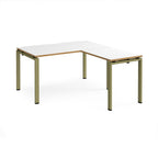 L-shaped desk with white top with wooden edges and green metal frame on a white background