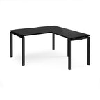 Black L-shaped desk with metal frame on a white background