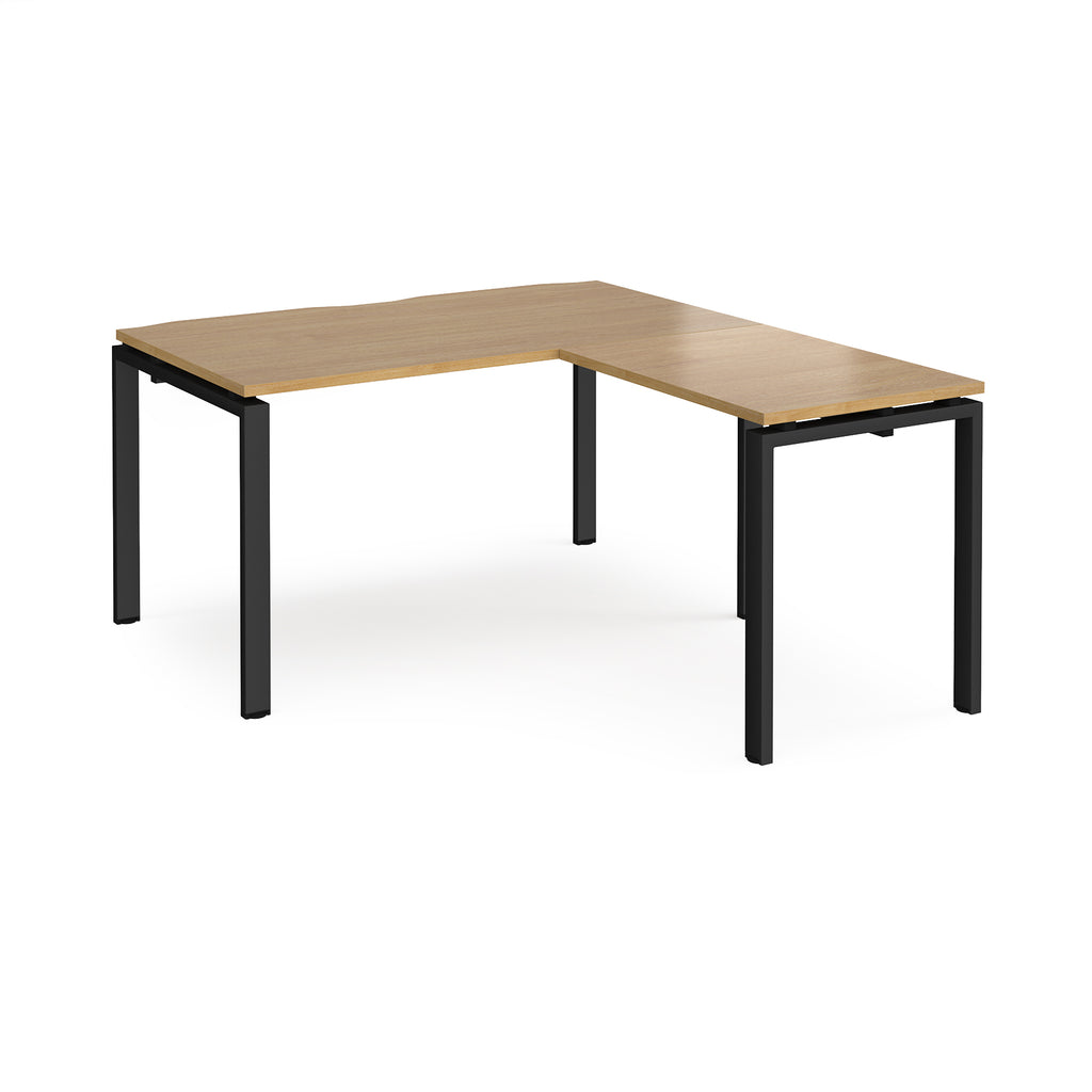 L-shaped desk with wood-effect top and black metal frame on a white background