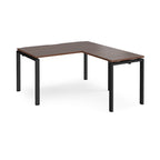 L-shaped desk with wood-effect top and black metal frame on a white background