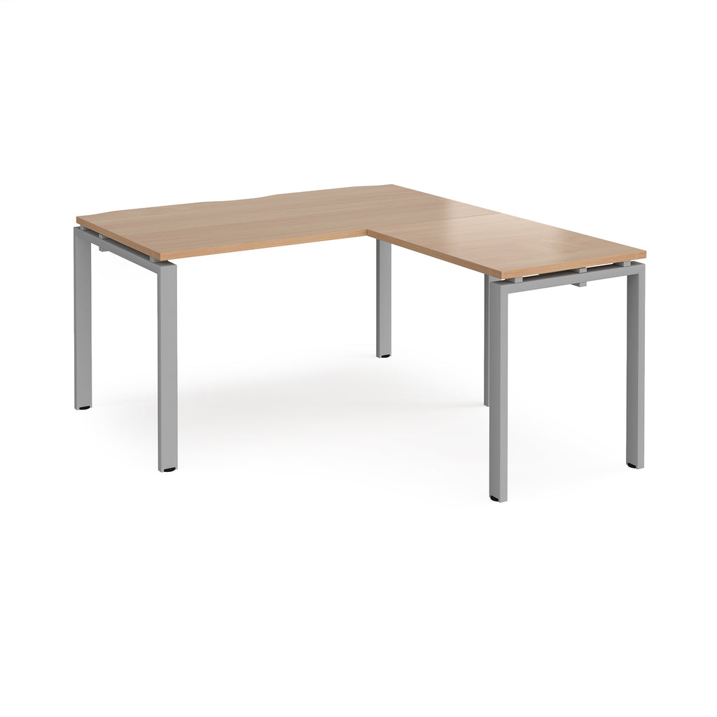 L-shaped desk with wood-effect top and silver metal frame on a white background