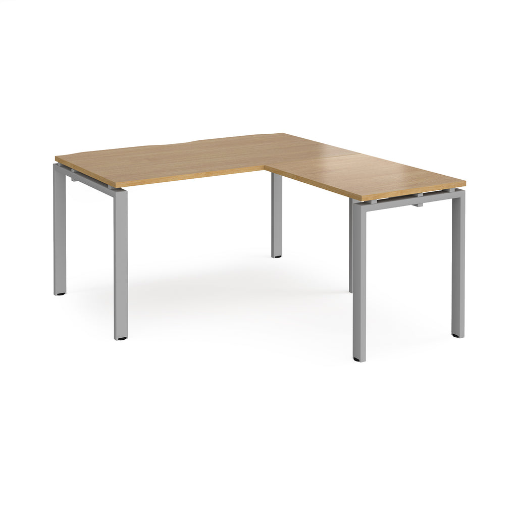 L-shaped desk with wood-effect top and silver metal frame on a white background